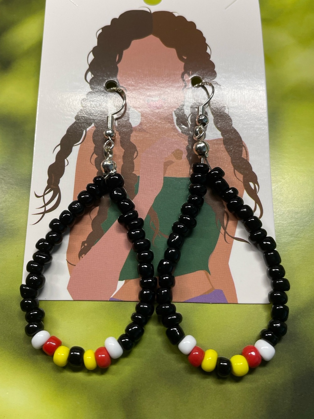 Hand Crafted Black Beaded Teardrop Earrings with Red, Yellow & White Accents